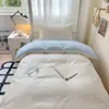 2026 Nuevo Modelo Color Sólido Dos Tonos Cama Individual para Estudiante Juego de Tres Piezas Cama Litera de Dormitorio Funda de Edredón Individual Funda de Edredón Pieza Única