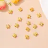 Retenção de cor forte areia dourada trevo de quatro folhas contas de cobre atacado de fábrica contas de ouro antigo hortênsia oca acessórios DIY