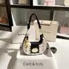 Entrega em uma peça moda versátil bolsa de ombro tecida sob o braço 2024 moda nicho bolsa de ombro Crescente atacado