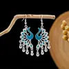 Aretes de Pavo Real Cloisonné Imitación Totem Minoría Miaoli Fénix Aretes de Campana Punto Escénico Aretes Calientes