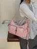 Bolso de axila de nicho coreano para mujer 2024 Nuevo Vintage Simple de alta gama Bolso cruzado Dulce Fresco Bolso de motociclista