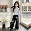 Conjunto de Dos Piezas de Moda para Niñas 2026: Sudadera de Manga Larga Estilo Universitario y Pantalones Casuales Anchos Sueltos