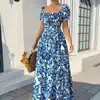Vestido de verão estilo europeu e americano com estampa francesa, mangas bufantes, amarração frontal na cintura e silhueta acinturada, disponível em versões de manga longa e curta