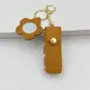 Llavero Espejo Pequeño Floral Creativo Transfronterizo Portátil Mini Bolsa de Cuero para Labial En Stock Llavero Colgante para Bolso Accesorio