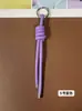 Llavero de cordón de cuero PU transfronterizo, colgante versátil para bolso, accesorios de decoración para botellas de agua y muñecas DIY, llaveros al por mayor