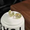 Nuevos Pendientes Sencillos de Metal Estilo Rombo Moda Retro Europea y Americana Elegantes Versátiles Estilo Metal Pendientes de Gama Alta