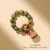 Nuevo juguete para el dedo de loto y hueso de aceituna retorcido a mano de sándalo verde estilo chino, pulsera suave para el dedo, cuentas budistas para mujeres y adorno para la mano para hombres