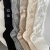 Versión Coreana 2025 Venta al por Mayor Nuevos Calcetines Transpirables de Color Sólido Versátiles de Moda para Otoño, Verano, Primavera Zhuji