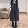 ¡Contrarresta el pedido! ¡Falda de botón tridimensional estilo Hepburn! Tela de lana europea otoño e invierno falda larga elegante para mujer