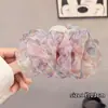 Pinza para el pelo floral francesa elegante morada para mujer 2026 Nueva pinza grande para el pelo con un toque de alta gama para la parte posterior de la cabeza
