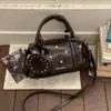 Bolsa de Mão Feminina Estilo Vintage Nova Primavera 2026 Bolsa Almofada Simples Versátil Bolsa de Ombro Transversal