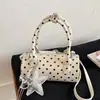 Bolso de mano coreano nuevo transfronterizo 2026, bolso tote pequeño para mujer, bolso cilíndrico de nicho de lunares de alta gama, bolso de hombro y bandolera