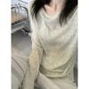 Suéter de cuello redondo básico versátil de manga larga para mujer, camiseta interior fina para primavera y verano, diseño de nicho microtransparente, top de nicho moderno