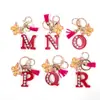 Llavero de Borla de Mariposa con Pedrería Transfronterizo con 26 Opciones de Letras, Colgante de Resina para Bolso, Accesorio de Regalo para Mejores Amigas