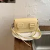Bolso de mujer de gran capacidad transfronterizo, nuevo modelo primavera 2026, bolso de hombro para debajo del brazo, juego madre-hija, bolso pequeño cuadrado para trabajo y uso diario de mujer