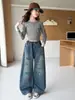Nuevos jeans de mezclilla de primavera y otoño para niñas mayores, ropa infantil, jeans con grafitis elegantes y versátiles para niñas