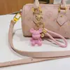 Llavero de oso con letra de muñeca de resina creativa, cuerda trenzada BV, llavero para llave de coche, colgante de paquete, regalo, venta al por mayor