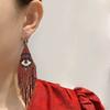 Cinco características, ojos, aretes, explosiones amazónicas, aretes de borla larga caliente transfronterizos europeos y americanos, aretes bohemios