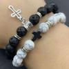 Venta caliente de AliExpress pulsera de cuentas negras pino blanco esmerilado piedra volcánica cruz cuerda de mano 8mm cuerda elástica