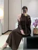 Conjunto de Chal con Borlas Tejido Francés para Mujer 2026 Principios de Primavera Nuevo Estilo Elegante Ajustado Suéter Falda Larga Conjunto de Dos Piezas