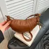 Bolso pequeño retro para mujer, nuevo diseño elegante, bolso croissant de moda y súper popular, bolso tipo dumpling, bolso de hombro y cruzado