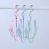 Estante creativo a prueba de viento para zapatos de balcón con doble gancho, un tendedero de zapatos multifuncional con ganchos para colgar y secar zapatos