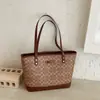 Bolso de mano de alta gama para mujer, nueva colección otoño/invierno 2026, bolso de hombro retro, adecuado para el trabajo y los desplazamientos, bolso tote de gran capacidad