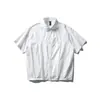 Ropa de Hombre Beijie Verano 2026 Nueva Camisa de Manga Corta de Color Sólido Desestructurada para Hombre Camisa de Media Manga Holgada con Dobladillo Elástico