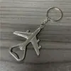 Abrebotellas de aleación de zinc con diseño de avión de dibujos animados, galvanizado, con logo publicitario láser, llavero de regalo