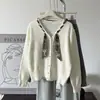 Nuevo cárdigan de punto para mujer para otoño e invierno con bufanda de seda, rejuvenecedor y adelgazante, adecuado como top o capa base, talla única