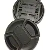 Cámara directa de fábrica universal alta calidad pellizco medio Sin palabras Cubierta de lente Cámara SLR Cubierta de hebilla anti-pérdida venta al por mayor