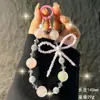 Nova Corrente de Celular com Laço de Strass, Pingente de Pulso, Bolsa Pequena Fashion com Pingente de Corrente de Miçangas, Chaveiro