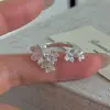 Anillo de flor pequeña vintage de diseño de nicho estilo coreano de plata de ley S925, anillo simple y moderno estilo coreano venta al por mayor