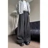 Pantalones de hombre de alta gama, simples, plisados, modernos, corte limpio, estilo callejero, versátiles, negros, fluidos, rectos, de pierna ancha