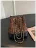 Bolso moderno y de moda con un toque exclusivo y de nicho, bolso de axila para mujer, nuevo bolso de hombro versátil vintage para mujer Otoño 2025