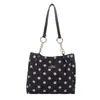 Bolsa de lunares nueva de verano 2026 Versión coreana Bolso tote de gran capacidad Para ir al trabajo Dulce Fresco Simple de alto valor Bolso de axila