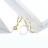 Pendientes de comercio electrónico transfronterizo para ojos de luna pendientes de circonita de ocho puntas joyería de moda exquisita para piercing al por mayor