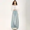 Venta Directa de Fábrica Jeans Marrones de Pierna Curva para Mujer Otoño/Invierno 2026 Diseño Holgado con Sentido del Estilo Pantalones de Pierna Ancha para Alargar la Figura