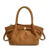 Bolso de mano retro de gamuza para mujer 2025 Nuevo de verano Bolso de mano esmerilado de alta gama Bolso cruzado casual para el trabajo
