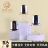 Em estoque novo frasco de vidro oval com conta-gotas de pressão 30ml Frasco de vidro para subembalagem de cuidados com a pele Frasco vazio para subembalagem de óleo essencial