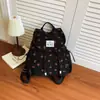 Mochila transfronteriza nueva de gran capacidad para mujer, moderna y casual, versátil para viajes cortos, con diseño de lazo