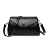 Nova bolsa cilíndrica flip-top transfronteiriça para mulheres, simples retrô luxo leve moda versátil grande capacidade bolsa de ombro transversal