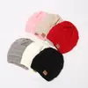 Gorro de punto para coleta de otoño e invierno al por mayor gorro de lana cálido con terciopelo venta directa gorro de luna simple para mujer gorro de cúpula