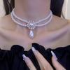 Corea del Sur Vintage Perla Diamante Borla Cadena de Cuello Celebridad Cibernética Sentido del Diseño Elegante Flor Lazo Cadena Clavicular Collar para Mujer