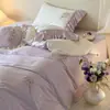Bordado floral fresco y elegante algodón puro hipoalergénico juego de ropa de cama individual/doble algodón de fibra larga conjunto de tres/cuatro piezas Golondrina Morada Llevando la Primavera