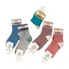 Calcetines de algodón gruesos de punto para bebé, otoño e invierno, altos, holgados, a rayas, con letras de dibujos animados, calcetines para niños, venta al por mayor, envío completo