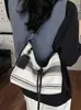 Bolso de hombro a rayas transfronterizo, bolso cruzado de color block moderno y a la moda, versátil para el uso diario casual y para ir al trabajo, bolso de axila 206 nuevo