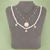 Venta Caliente Transfronteriza Romántico Francés Acero de Titanio Incrustado con Nácar Blanco DIY Moda Colgante Pendientes Collar Joyería Colgante
