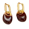 Pendientes de gota de agua irregulares de alta gama, pendientes versátiles de lujo ligero, diseño de nicho para mujer