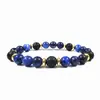 Elegante Pulsera de Piedra de Lava Azul y Negra con Separadores Dorados con un diseño elegante de cuentas de piedra natural acentuadas con separadores dorados para un look moderno chic Perfecta para uso casual o formal añadiendo un toque estiloso a cualquier atuendo